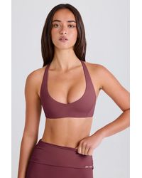 BO+TEE - Crossback V-Neck Sports Bra - Lyst