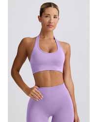 BO+TEE - Define Luxe Halterneck Sports Bra - Lyst