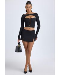 Oh Polly - Modal Button-Detail Low-Rise Mini Skirt - Lyst