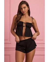 Oh Polly - Mid-Rise Flared Shorts - Lyst