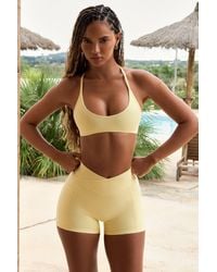 BO+TEE - Soft Active Pocket V-Waist Mini Shorts - Lyst