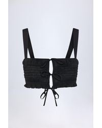 Oh Polly - Ruffled Tie-Front Crop Top - Lyst