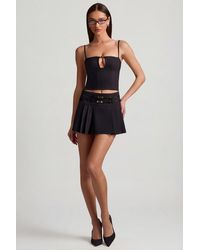 Oh Polly - Belted Low-Rise Pleated Mini Skirt - Lyst