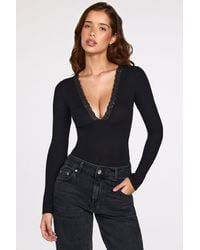 Oh Polly - Ribbed Modal Long-Sleeve Plunge Bodysuit - Lyst