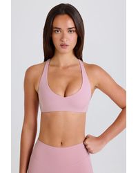 BO+TEE - Crossback V-Neck Sports Bra - Lyst