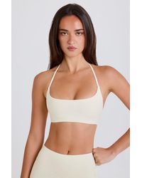 BO+TEE - Scoop-Neck Halterneck Sports Bra - Lyst