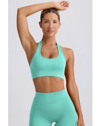 BO+TEE - Define Luxe Halterneck Sports Bra - Lyst