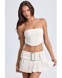 Oh Polly - Belted Pleated Low-Rise Micro Mini Skirt - Lyst