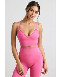 BO+TEE - Define Luxe V-Neck Sports Bra - Lyst