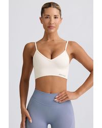 BO+TEE - Define Luxe V-Neck Sports Bra - Lyst