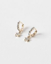 Oliver Bonas - Stella Star Charm Drop Gold Huggie Earrings - Lyst