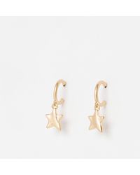 Oliver Bonas - Viola Tone Star Charm Drop Earrings - Lyst