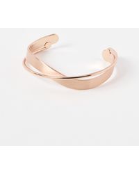 Oliver Bonas - Agatha Twist Rose Gold Bangle - Lyst