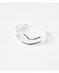 Oliver Bonas - Ilse Wavy Double Row Tone Bangle - Lyst