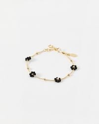 Oliver Bonas - Rosaria Black Beaded Flower Gold Tone Chain Bracelet - Lyst