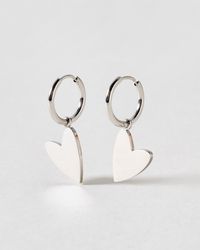 Oliver Bonas - Billie Tone Waterproof Heart Huggie Earrings - Lyst