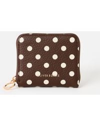 Oliver Bonas - Lola Chocolate Polka Dot Zip Around Purse - Lyst