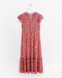 Oliver Bonas - Textured Floral Shirred Pink Midi Dress, Size 6 - Lyst