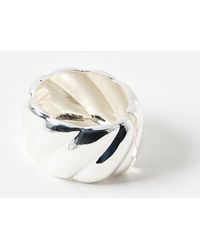 Oliver Bonas - Jael Puffy Twisted Tone Bangle - Lyst