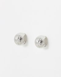 Oliver Bonas - Hali Textured Metal Circular Silver Hoop Earrings - Lyst