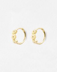 Oliver Bonas - Triple Flower Clicker Hoop Earrings - Lyst