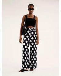 OMNES - Lynx Satin Wide Leg Spot Print Trouser - Lyst