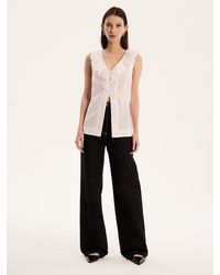 OMNES - Rachael Frill Collar Sleeveless Blouse - Lyst