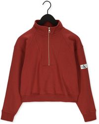 und Fitnesskleidung Sweatshirts Calvin Klein Sweatshirt Badge Half Zip Sweatshirt in Rot Training Damen Bekleidung Sport- 