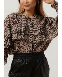 Alix The Label - Bluse Ladies Woven Animal Ruffle Blouse - Lyst