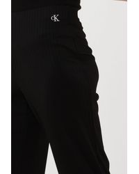 Calvin Klein - Weite Hose Shiny Rib Wide Leg Pants - Lyst