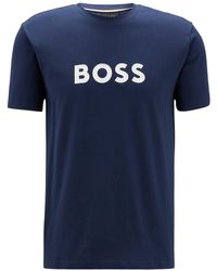 BOSS - T- Sun UV Protection (1-tlg) Beach Shirt aus reiner Baumwolle mit großem Logo-Print - Lyst