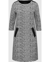 Bianca - Jerseykleid DANILO mit modernem Strukturmuster und Zippertaschen - Lyst