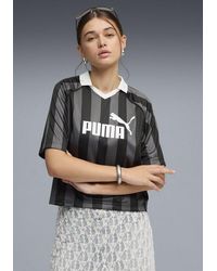 PUMA - T-Shirt Ess Jersey Lockere Passform, Kurzarm, Atmungsaktiv, Mit V-Ausschnitt - Lyst