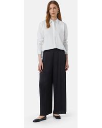 Comma, - Stoffhose Fließende Plissee-Hose mit leichtem Glanz Gummizug - Lyst