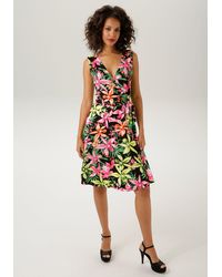 Aniston CASUAL - Sommerkleid mit farbenfrohem, großflächigem Blumendruck - Lyst