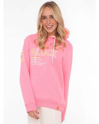 Zwillingsherz - Hoodie "ü" mit Schriftzug Glück und Kängurutaschen - Lyst