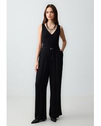 Jimmy Key - Gerade geschnittener ärmelloser Jumpsuit aus gewebtem Leinen mit Gürte - Lyst