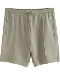 Next - Jersey-Shorts mit RV-Taschen und Bundfalten (1-tlg) - Lyst