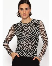 SassyClassy - Animal Print Langarmshirt transparenter Stoff Figurbetonte Mesh Bluse elegant in Schlangen Zebra Optik Schwarz - Lyst
