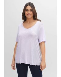 Sheego - T-Shirt Große Größen mit weitem V-Ausschnitt und Rollkanten - Lyst