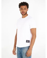 Calvin Klein - T-Shirt BADGE TURN UP SLEEVE mit Logopatch - Lyst