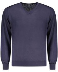 Guess - Strickpullover Eleganter pullover in Blau mit V-Ausschnitt und Logo - Lyst