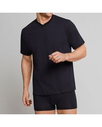 Schiesser - T-Shirt (4-tlg) V-Ausschnitt, kurzarm, verstärkte Halsnaht, im 4er Pack - Lyst