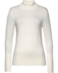 Lascana - Strickpullover mit Zierknöpfen am Ärmelabschluss, leichter Rollkragenpullover, Basic - Lyst