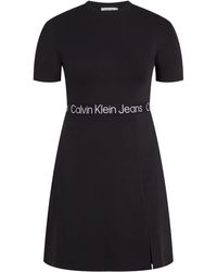 Calvin Klein - Calvin Klein Jeans Skaterkleid PLUS TAPE MILANO SS DRESS in Groß Größen und mit Logoschriftzug - Lyst