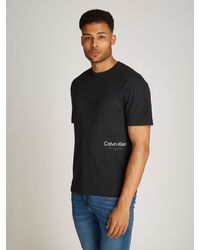 Calvin Klein - OFF PLACEMENT LOGO T-SHIRT mit Logoschriftzug - Lyst