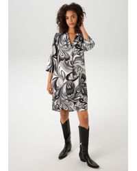 Aniston CASUAL - Sommerkleid mit farbharmonischem, graphischem Druck - Lyst