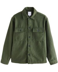 Next - Blusenjacke Karierte Hemdjacke mit zwei Taschen und Wolle (1-St) - Lyst