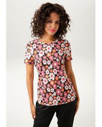 Aniston CASUAL - T-Shirt mit farbharmonischen Blumen - Lyst