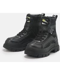 Buffalo - Aspha Com1 Vegan Winterboots Schnürstiefelette, Plateauboots Mit Innen-Reißverschluss - Lyst